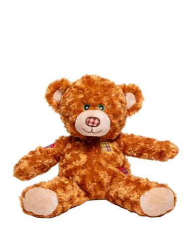 brown bear stuffed animal with patches