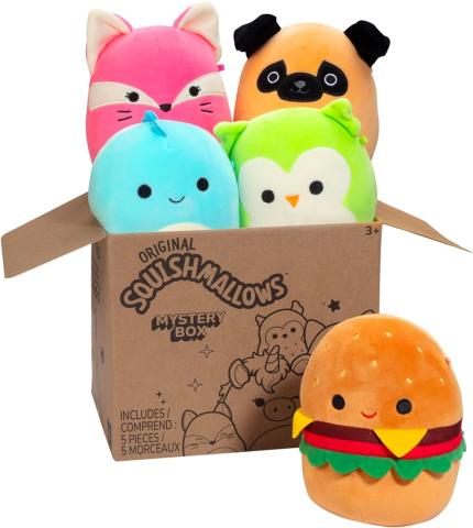 Picture of a cardboard box featuring five different Squishmallows. 
