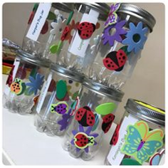 Picture of clear jars with ladybug stickers