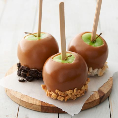 picture of caramel apples with toppings