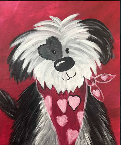 Black and white dog with heart bandana and heart shaped eye