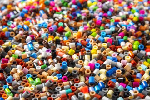 An image depicting a huge pile of Perler beads.