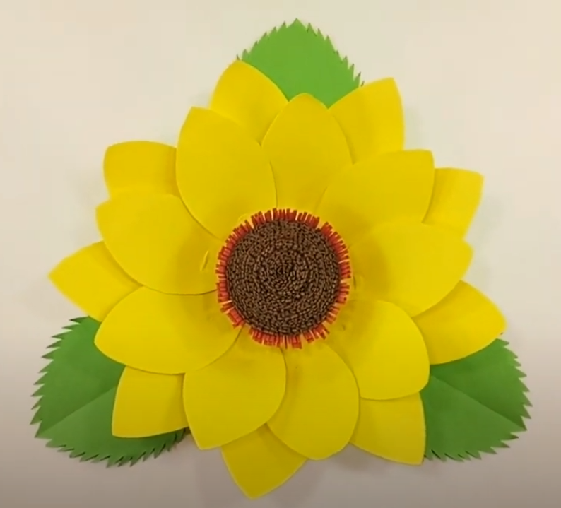 A picture of a sunflower craft.