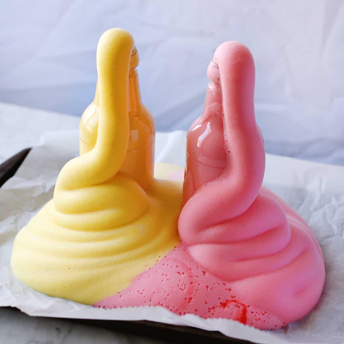 Picture of elephant toothpaste experiment foaming yellow and pink reactions