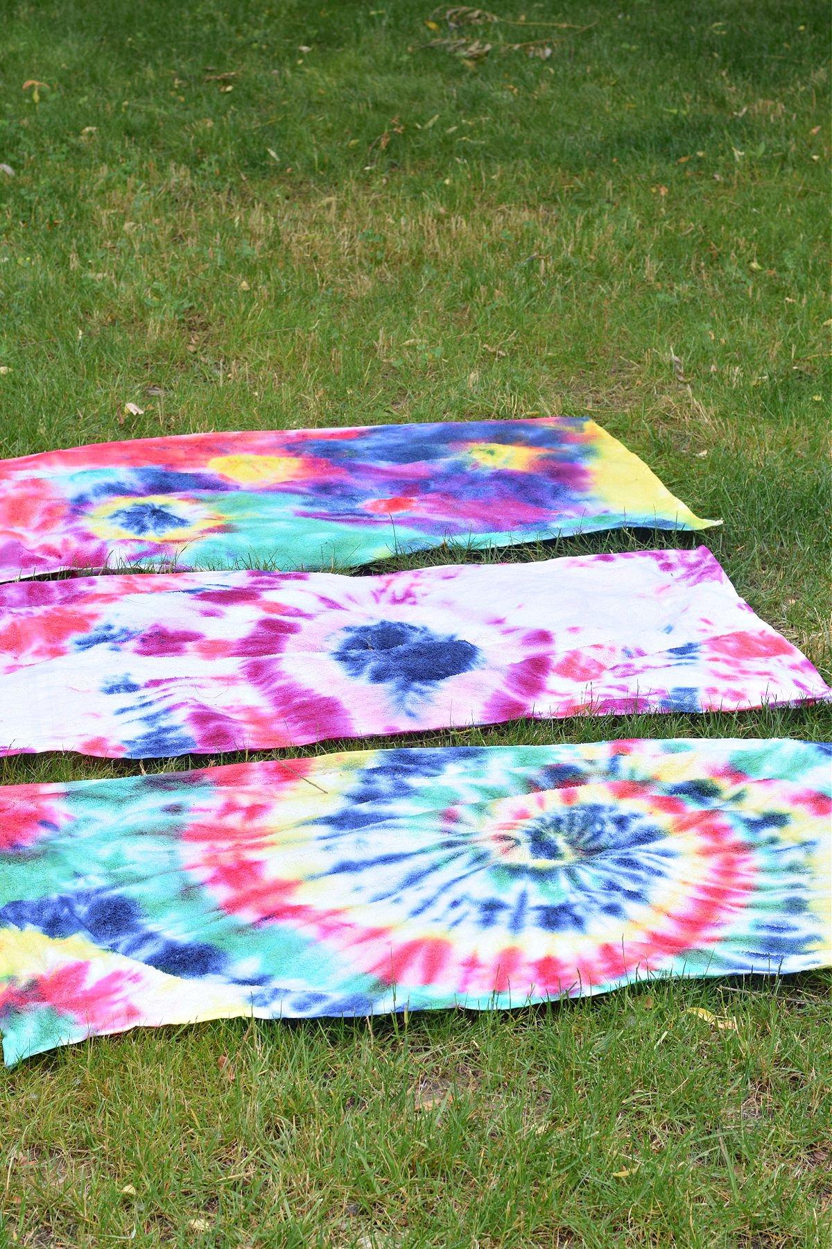 Picture of tie dyed towels on grass
